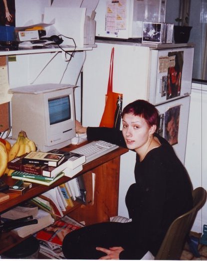 Rachel Rose, in a cold Canadian winter, in front of a Mac Classic.